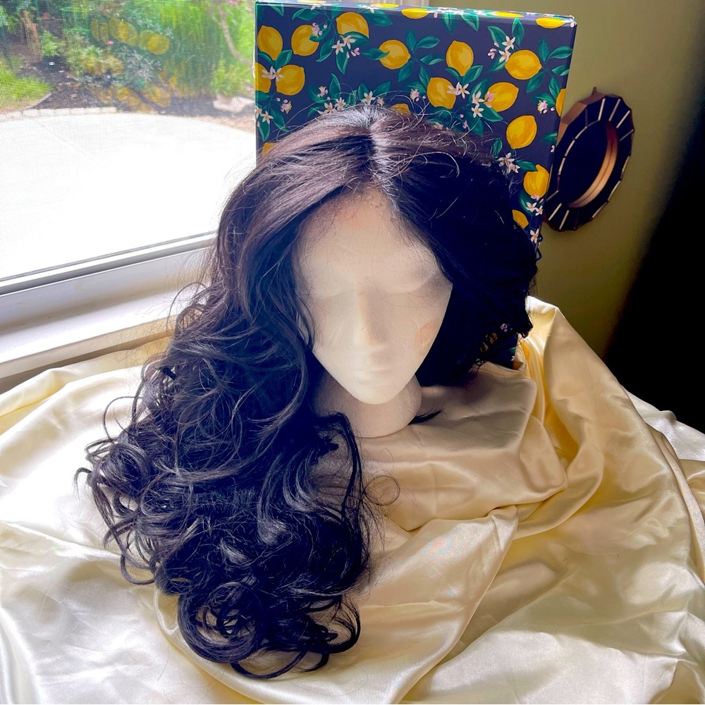 Long, black wig with romantic loose curls/waves